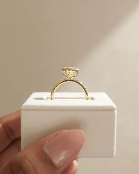 Raised bezel over open crossed gallery, side view