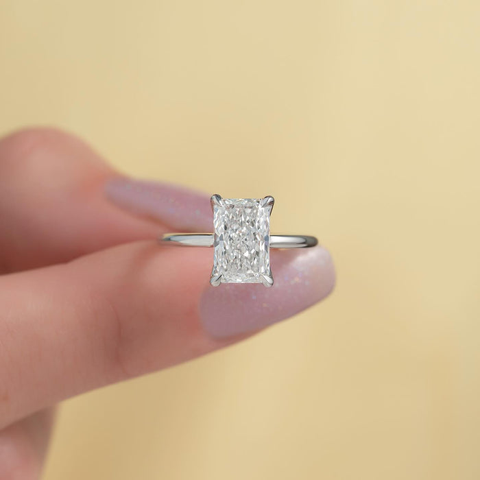 Radiant cut lab grown diamond solitaire on a knife edge white gold band, front view