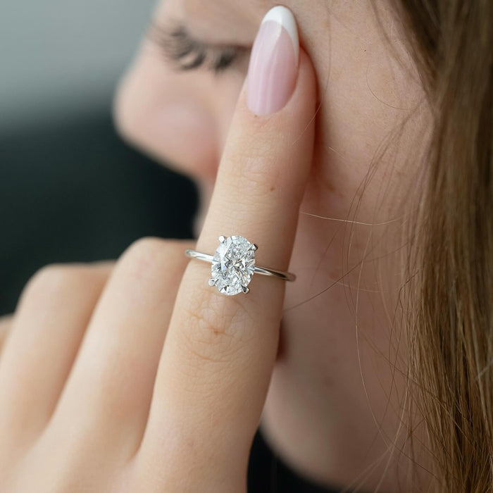 Profile of the round brilliant solitaire showing the rising cathedral shoulders