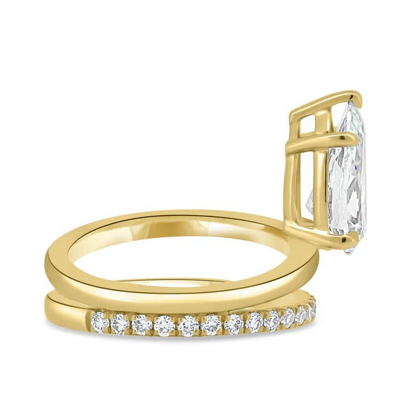 Pear cut lab grown diamond engagement ring and wedding band set