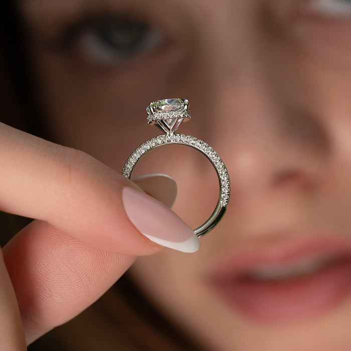 Pave set shank of the cushion cut diamond engagement ring
