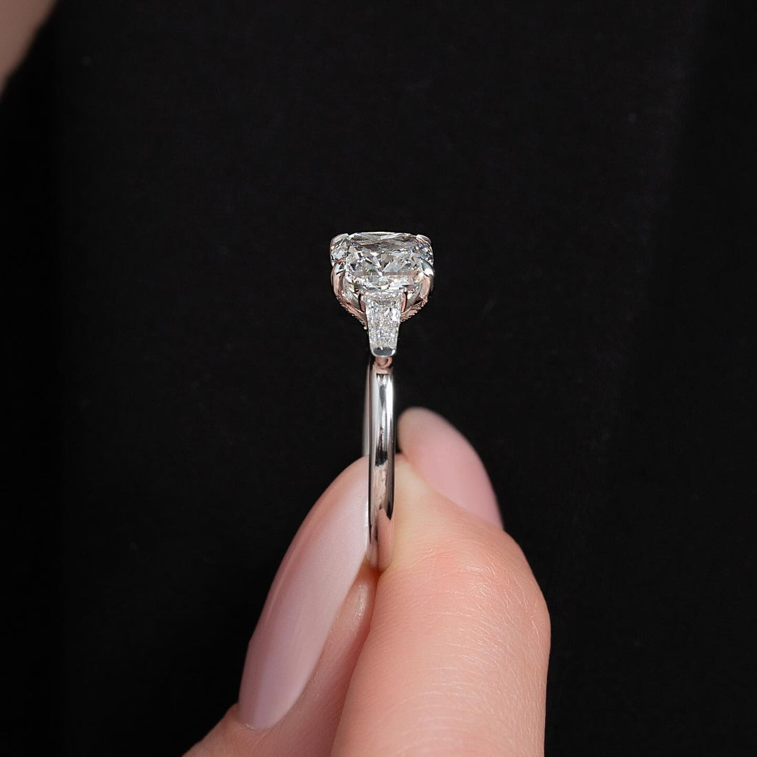 Cushion moissanite three stone tapered baguette ring profile in white gold
