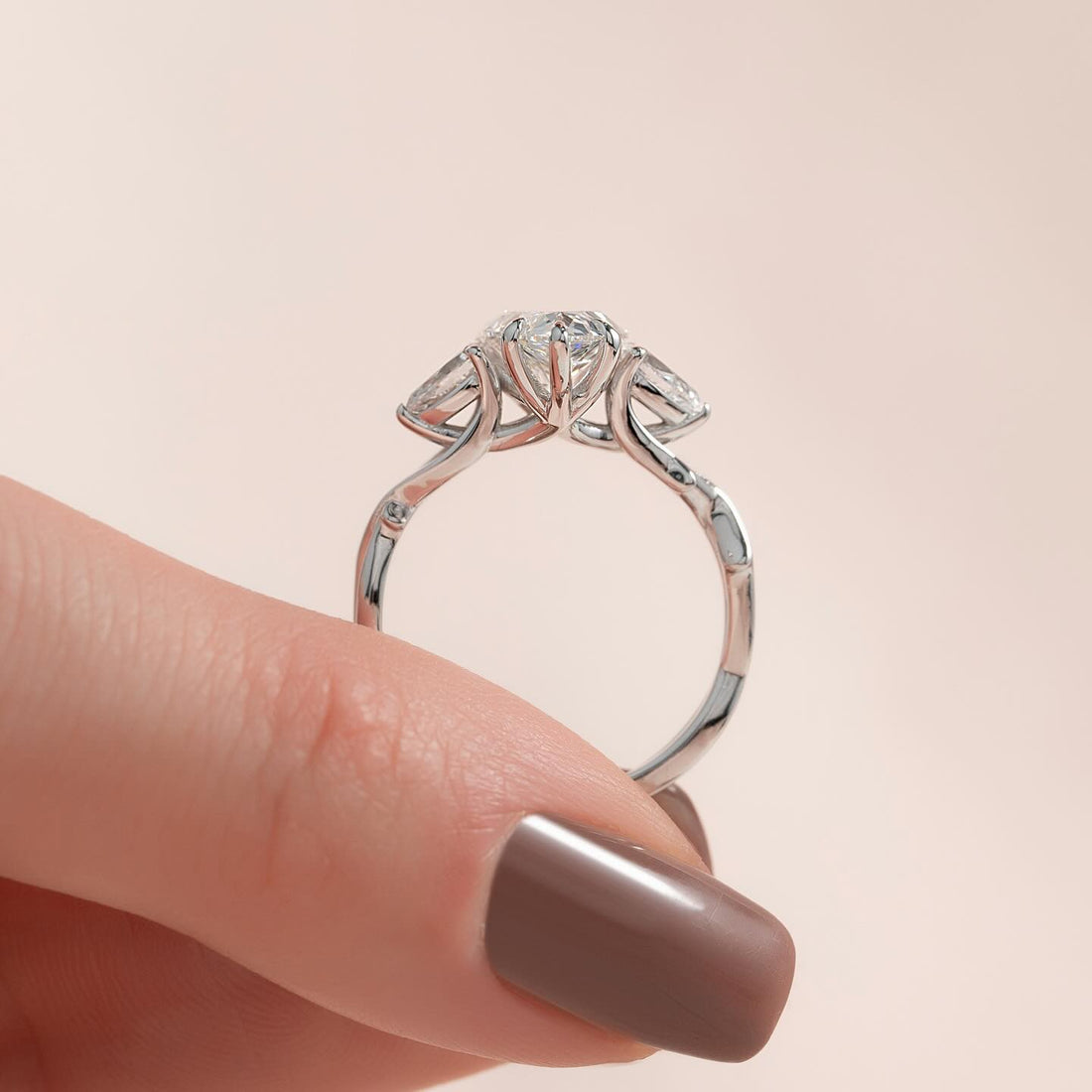 Pear moissanite three stone pear accent ring profile in white gold