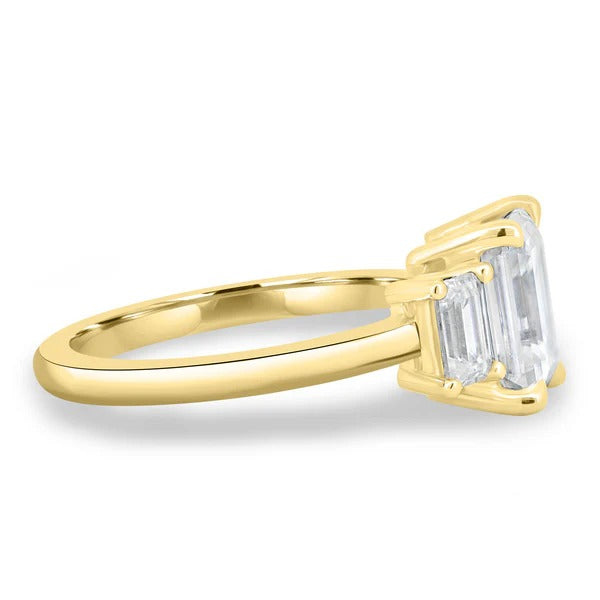 Side view showing all three step cut stones in line on a plain band