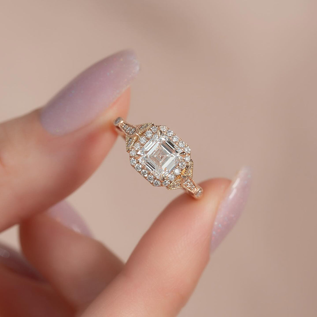 Asscher cut lab grown diamond art deco halo ring with kite side stones in rose gold