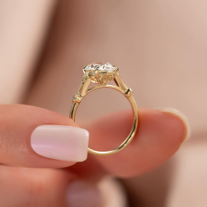 Bezel set round diamond accent on the vintage shoulder panel