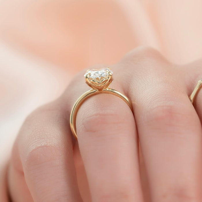 Oval moissanite petite solitaire ring profile in yellow gold