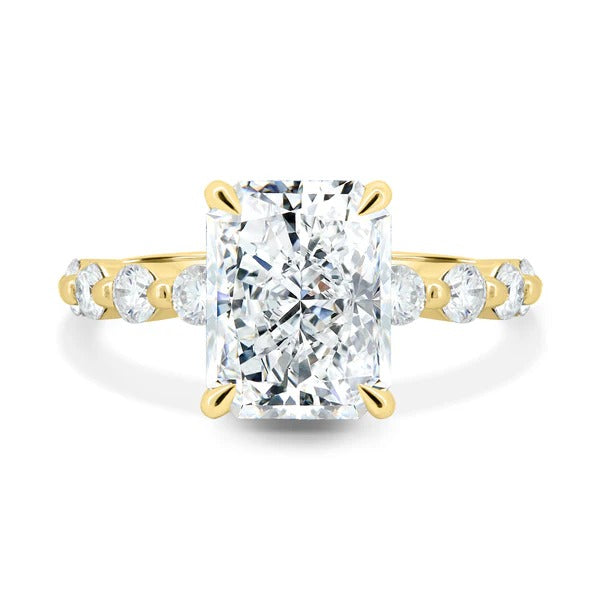 Radiant cut lab grown diamond hidden halo ring with graduated round side stones