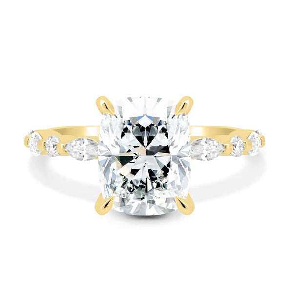 Elongated cushion cut lab grown diamond ring with marquise and round accent stones