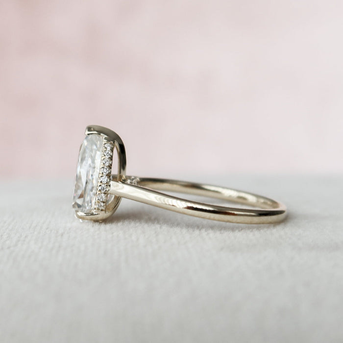 Pear cut lab grown diamond Art Nouveau wedding ring, angled view
