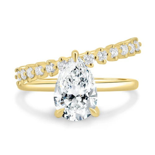 Pear cut diamond engagement ring and curved wedding band set