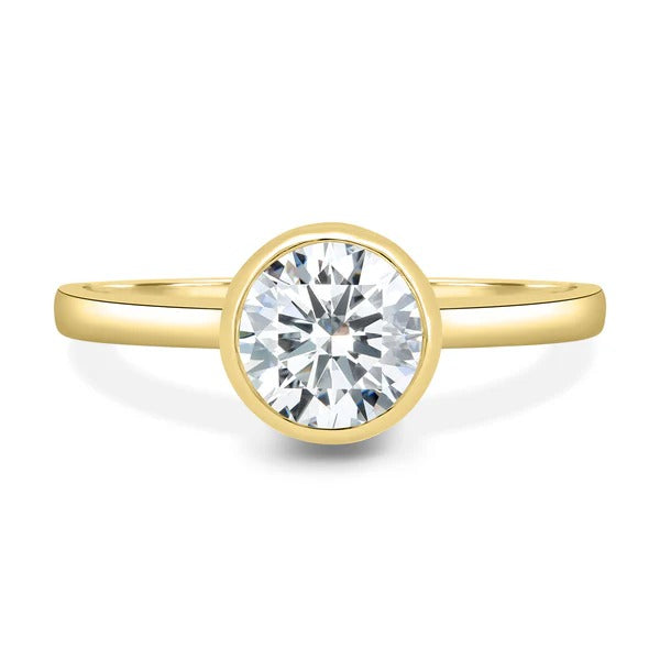 Full rub over bezel round diamond ring side profile