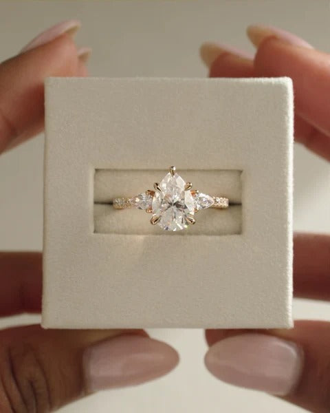 Pear cut lab grown diamond trilogy ring with pear side stones