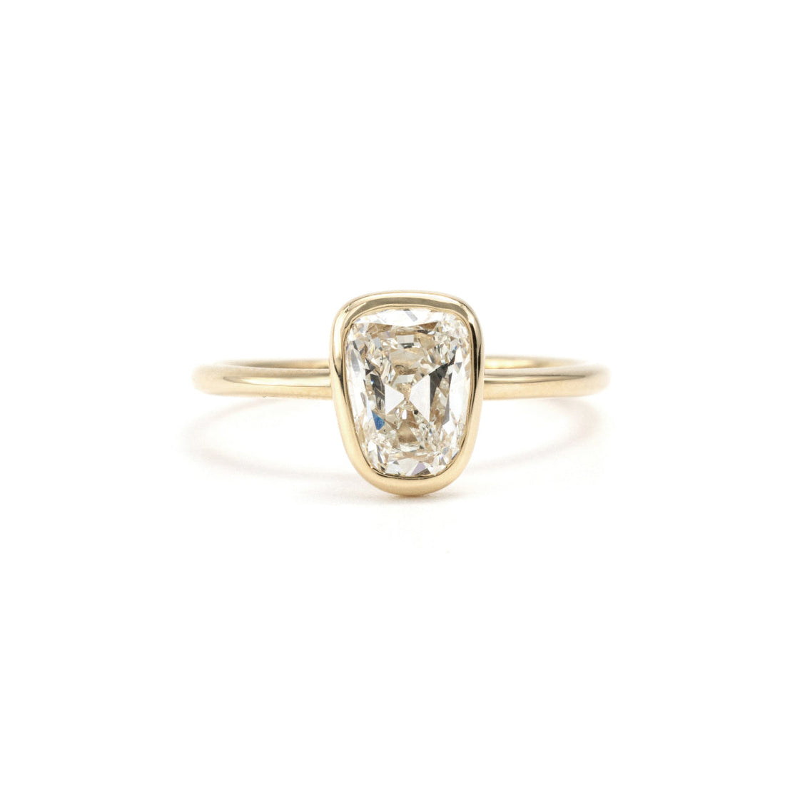 Old mine cut lab grown diamond bezel set solitaire ring in 14K yellow gold