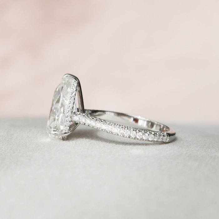 Pear cut lab grown diamond Art Deco anniversary ring, angled view