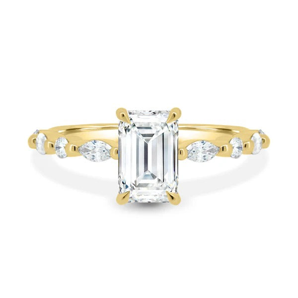 Emerald cut lab grown diamond solitaire ring with marquise and round station set accent band