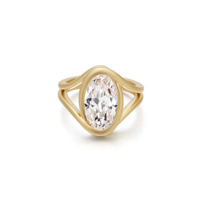 Marquise old mine cut lab grown diamond in a matte sculptural bezel ring in gold