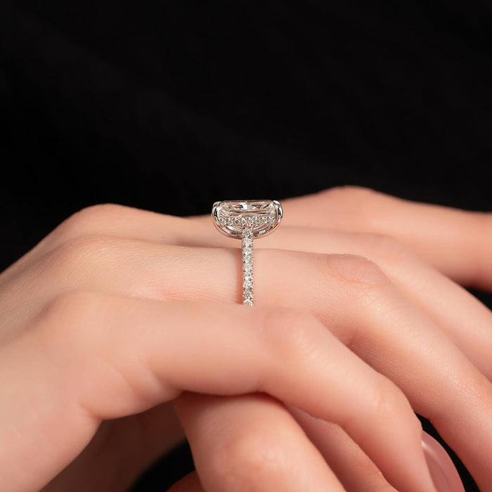 Radiant cut lab grown diamond set sideways on a micro pave shank