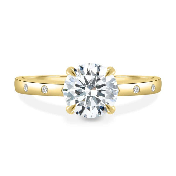 Flush set accent diamonds level with the surface of the band
