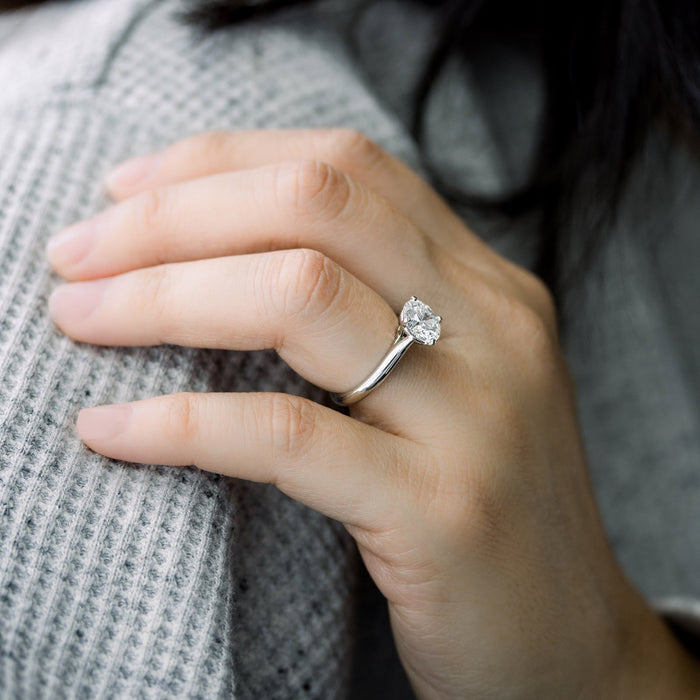 Round brilliant lab grown diamond wedding ring, angled view