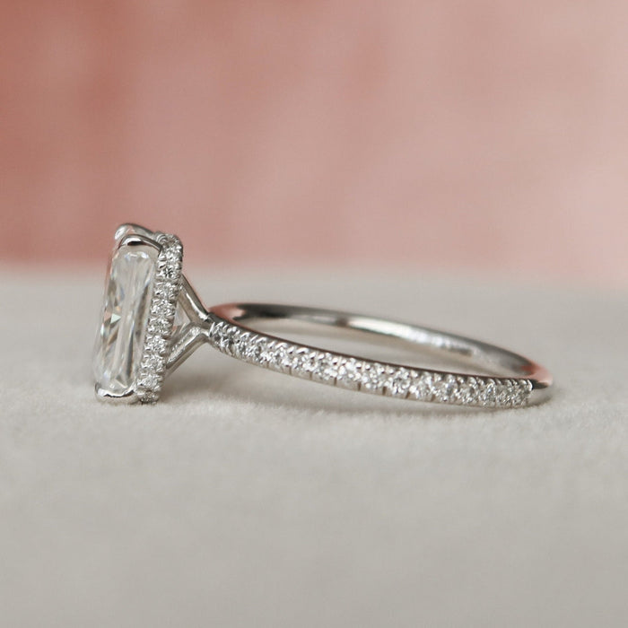 Radiant cut lab grown diamond avant garde wedding ring, angled view