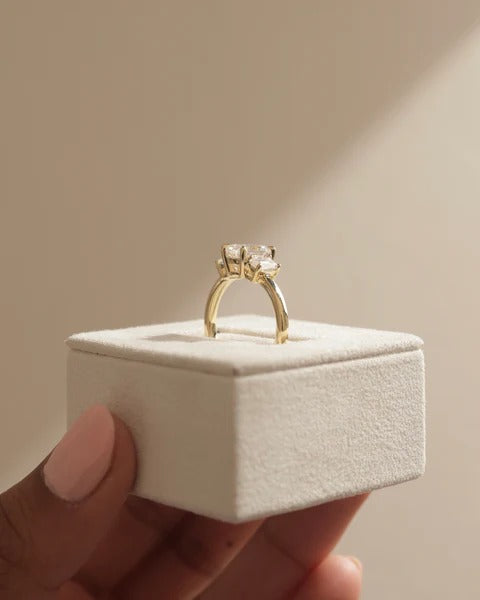 Emerald cut lab grown diamond trilogy ring with matched emerald cut side stones