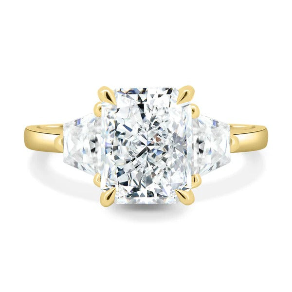 Radiant cut lab grown diamond trilogy ring with trapezoid side stones