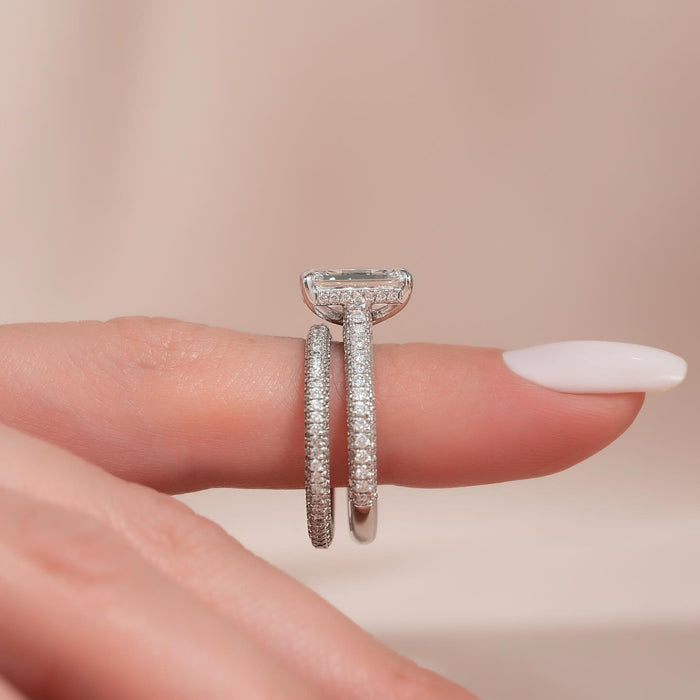 Emerald cut lab grown diamond bridal set with three sided pave bands in white gold