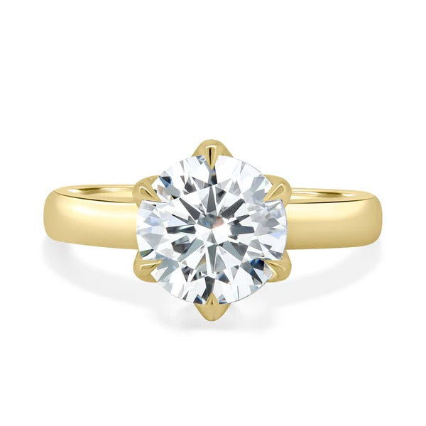 Round cut lab grown diamond six claw solitaire ring on wide cigar band