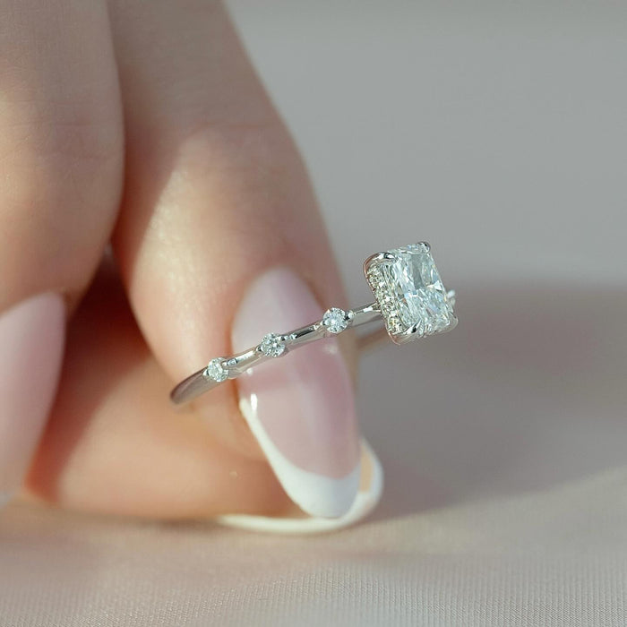 Close view of the radiant cut lab grown diamond and the accent points along the shank