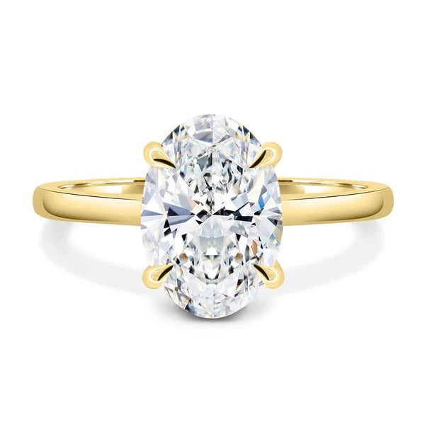 Oval cut lab grown diamond slim claw solitaire ring
