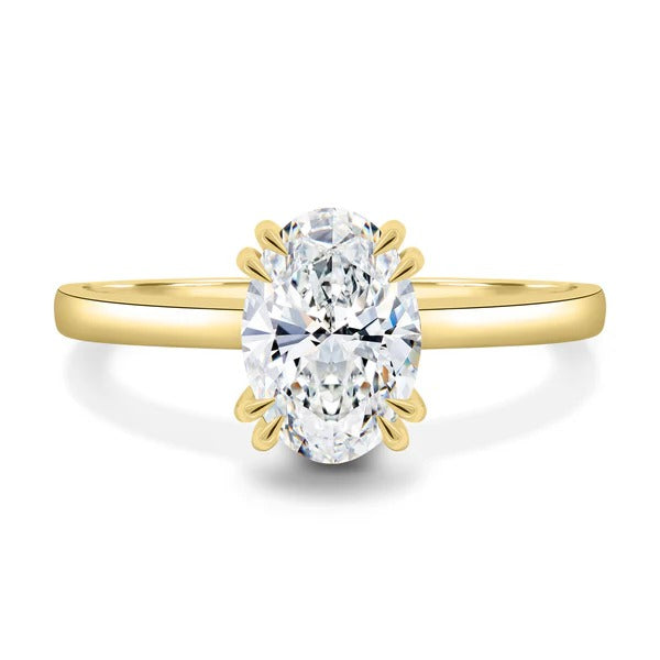 Oval cut lab grown diamond double tipped claw solitaire ring