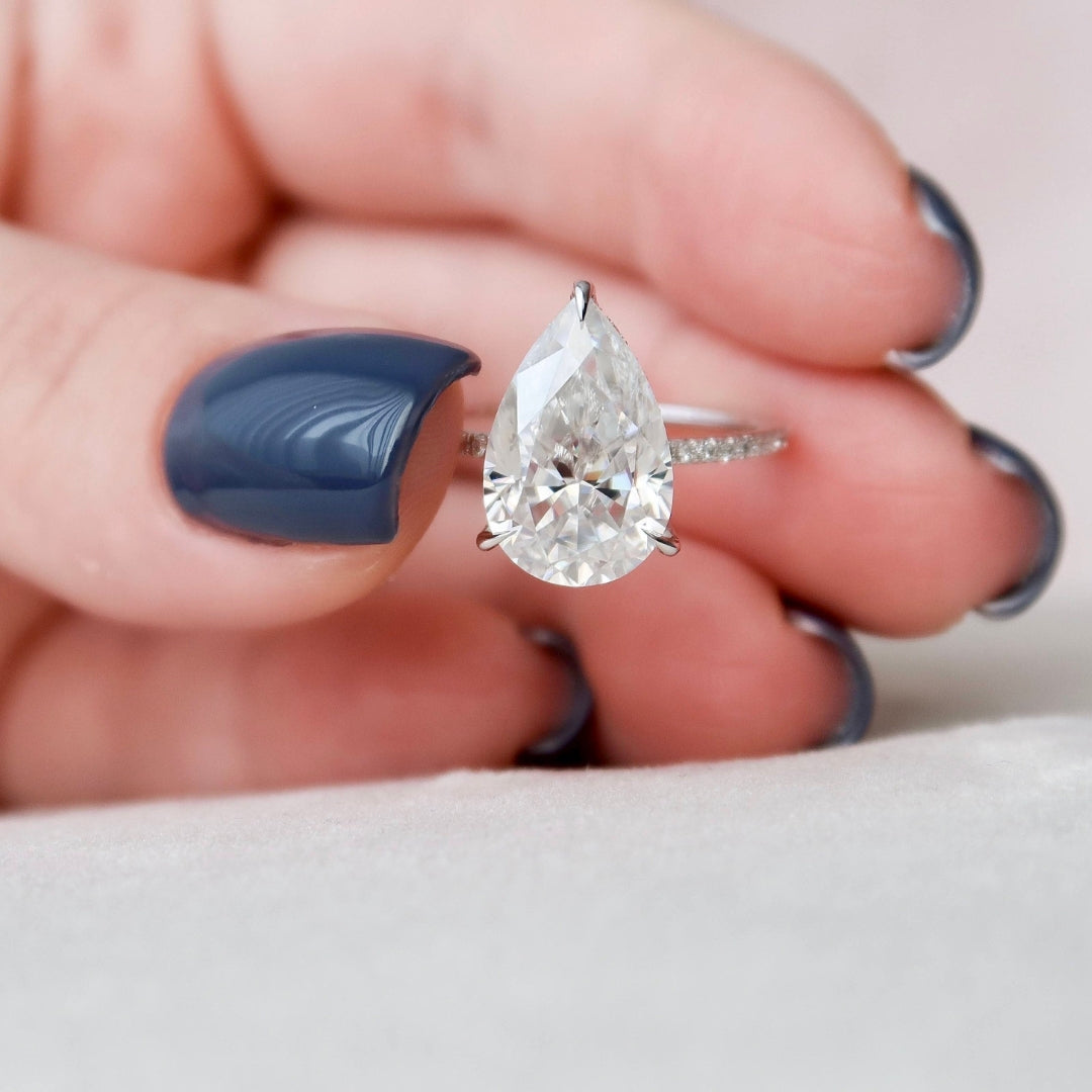Avant garde pear cut lab grown diamond anniversary ring, front view