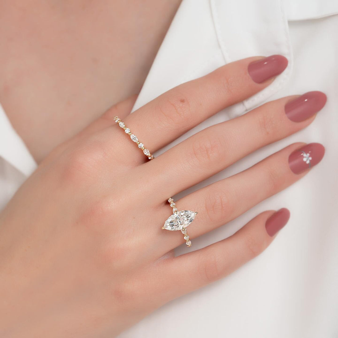 East west marquise lab grown diamond ring with alternating accent band in yellow gold