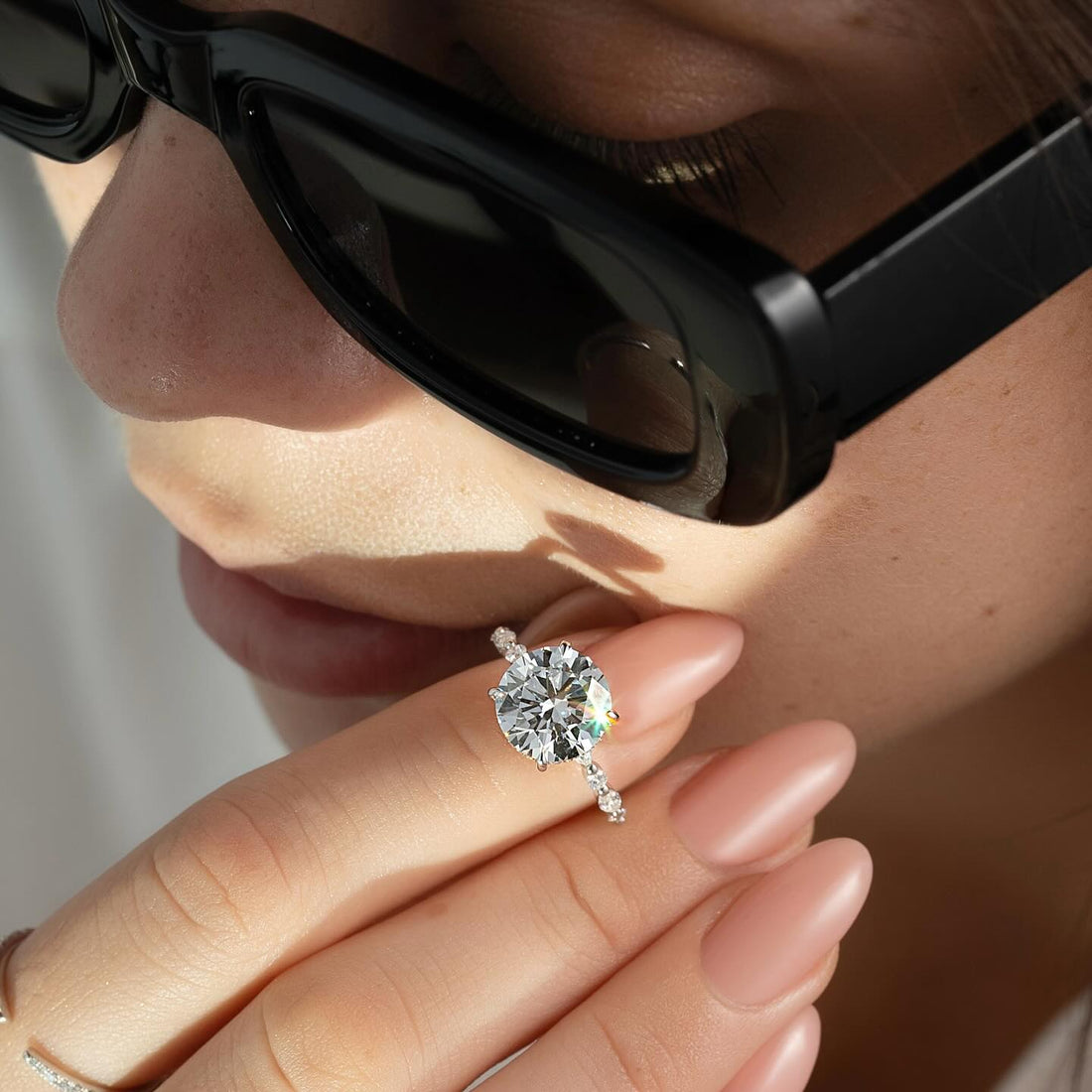 Round lab grown diamond ring with graduated spaced accent band in white gold