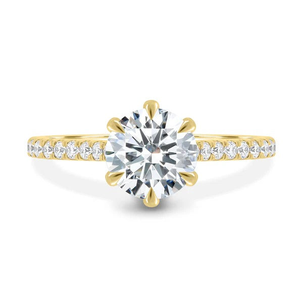 Round cut lab grown diamond six claw solitaire ring with bead set pave band