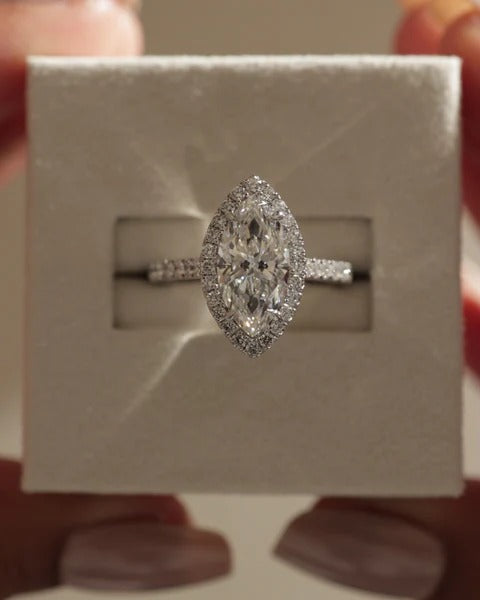 Marquise cut lab grown diamond visible halo ring with pave shoulders