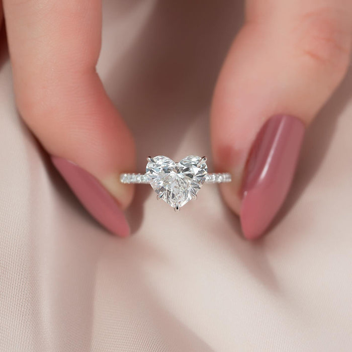 Heart cut lab grown diamond solitaire ring with pave shoulders in white gold