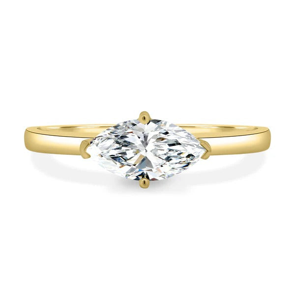 East west marquise cut lab grown diamond four claw ring on a slim plain band