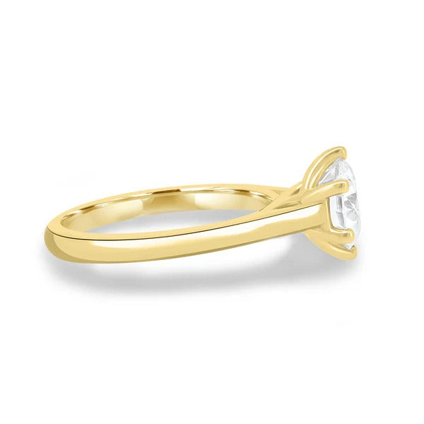 Six flat paddle tipped claws holding the round brilliant diamond