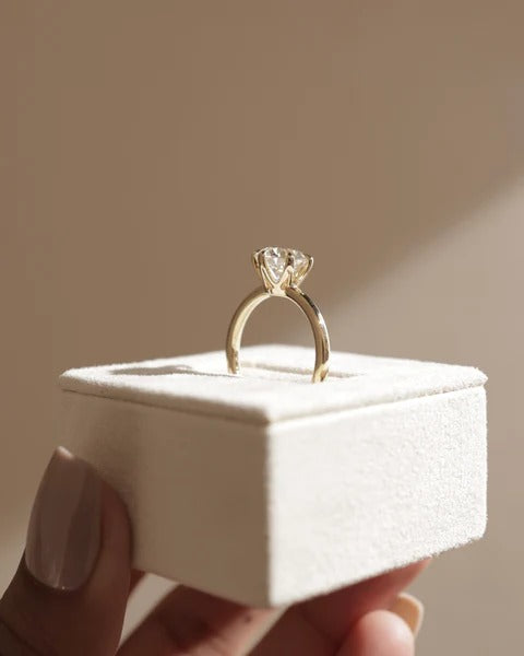 Low set round diamond solitaire side profile