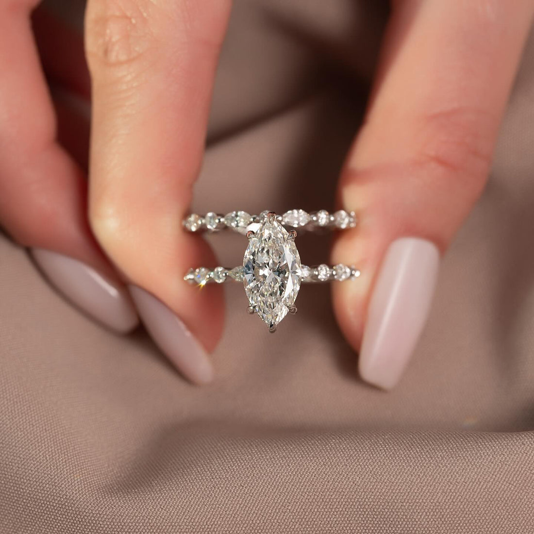 Marquise cut lab grown diamond hidden halo ring with station accent band in white gold