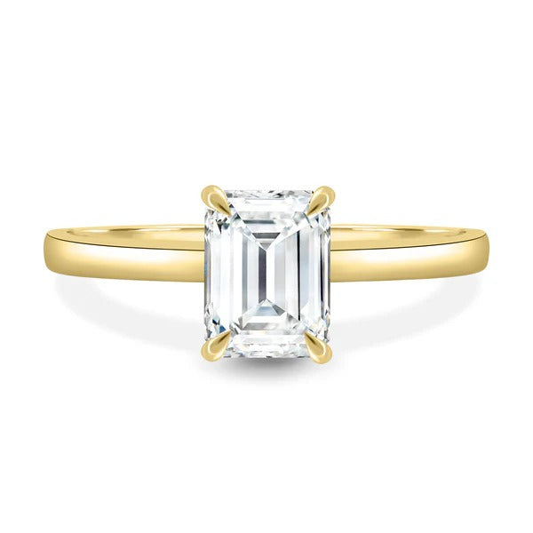 Hidden halo visible beneath emerald cut diamond in side profile