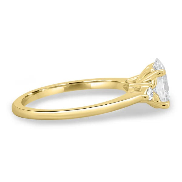 Oval cut diamond trilogy ring with pear sides side profile