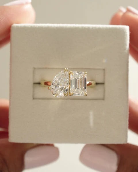 Pear and emerald cut lab grown diamond toi et moi ring