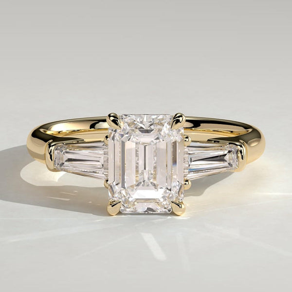 Emerald Cut Lab Grown Diamond Three Stone Ring with Tapered Baguette Sides in Silver, 10K, 14K and 18K Gold
