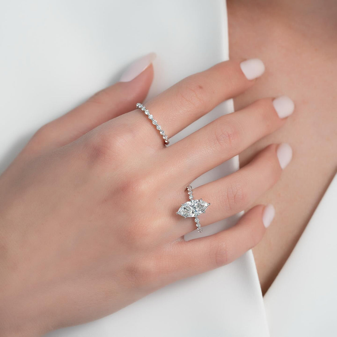 East west marquise cut lab grown diamond ring with pave shoulders in white gold