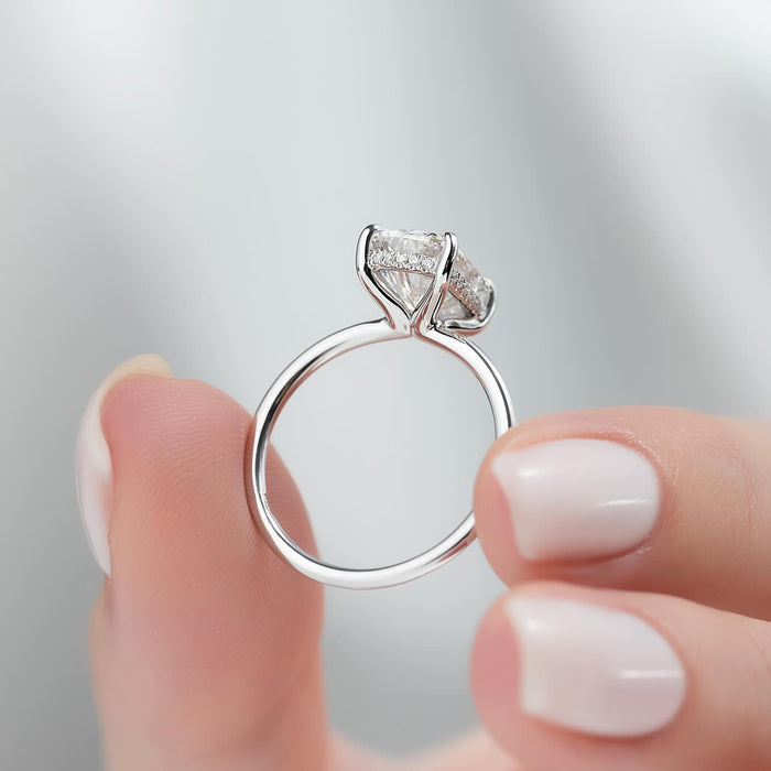 Profile of the elongated cushion lab grown diamond ring showing the concealed halo and plain band