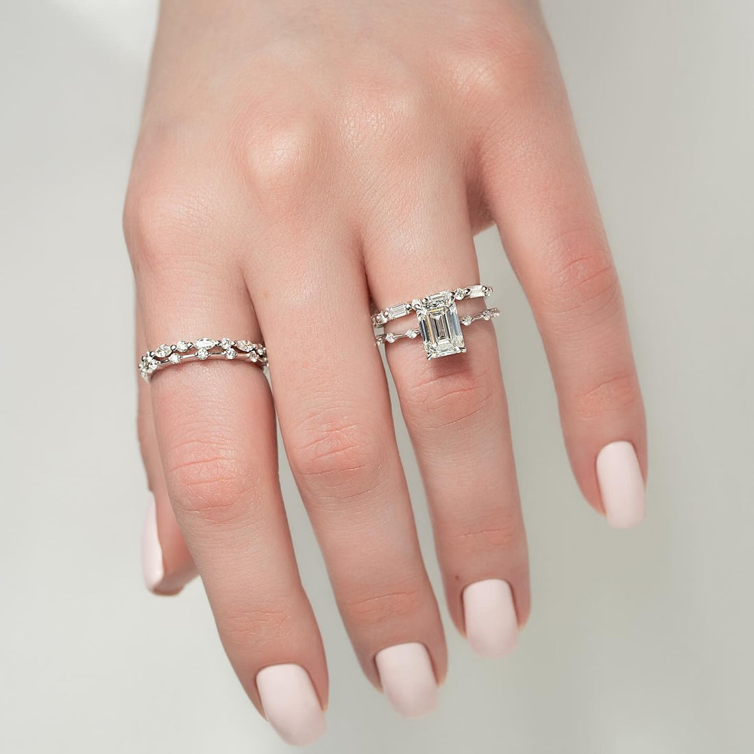 Elongated cushion cut lab grown diamond ring in white gold on a wide French pave shank