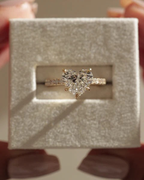Heart cut lab grown diamond solitaire ring with pave band
